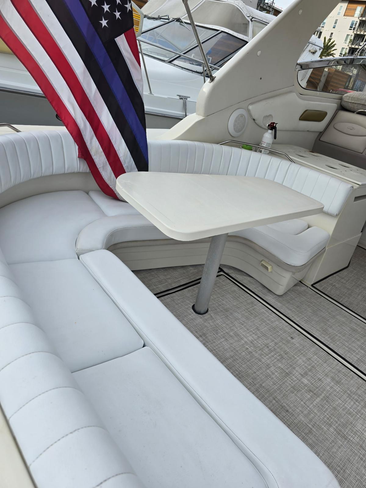 Clean boat cockpit with white upholstery